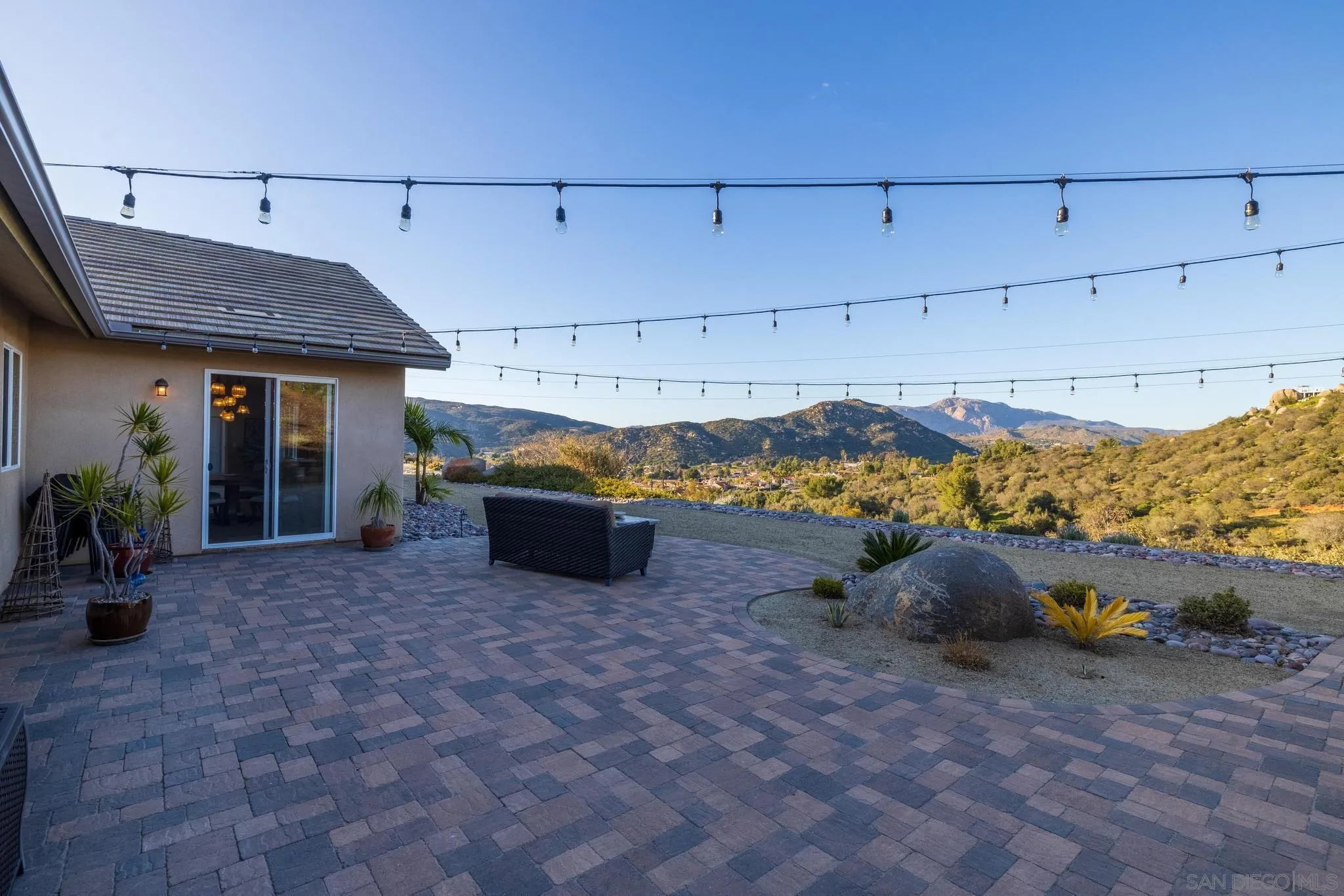 578 North Alpine Trail Road Alpine, CA 91901 - Photo 36 of 50 a swimming pool with lawn chairs and potted plants