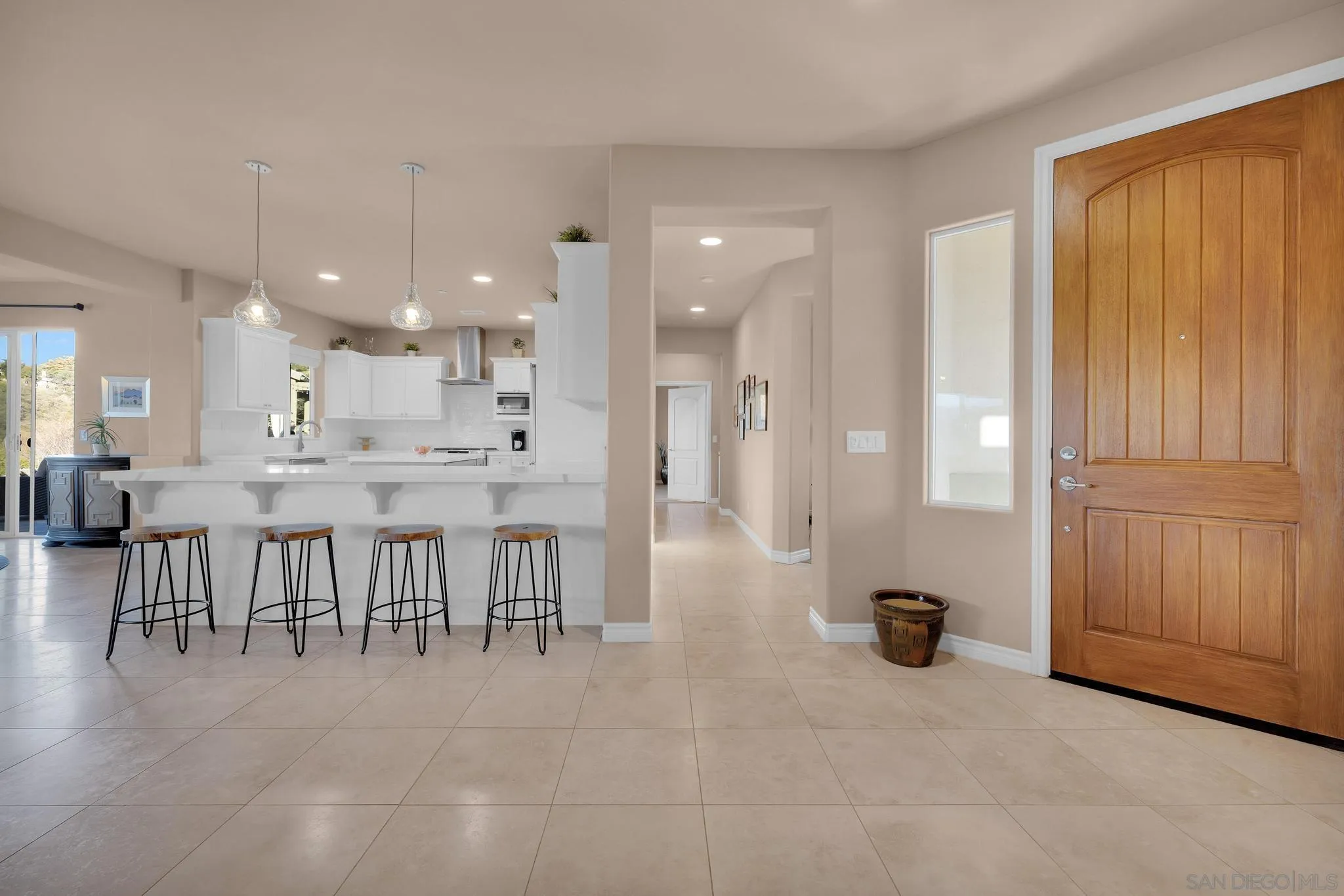 578 North Alpine Trail Road Alpine, CA 91901 - Photo 7 of 50 a large kitchen with a table and chairs