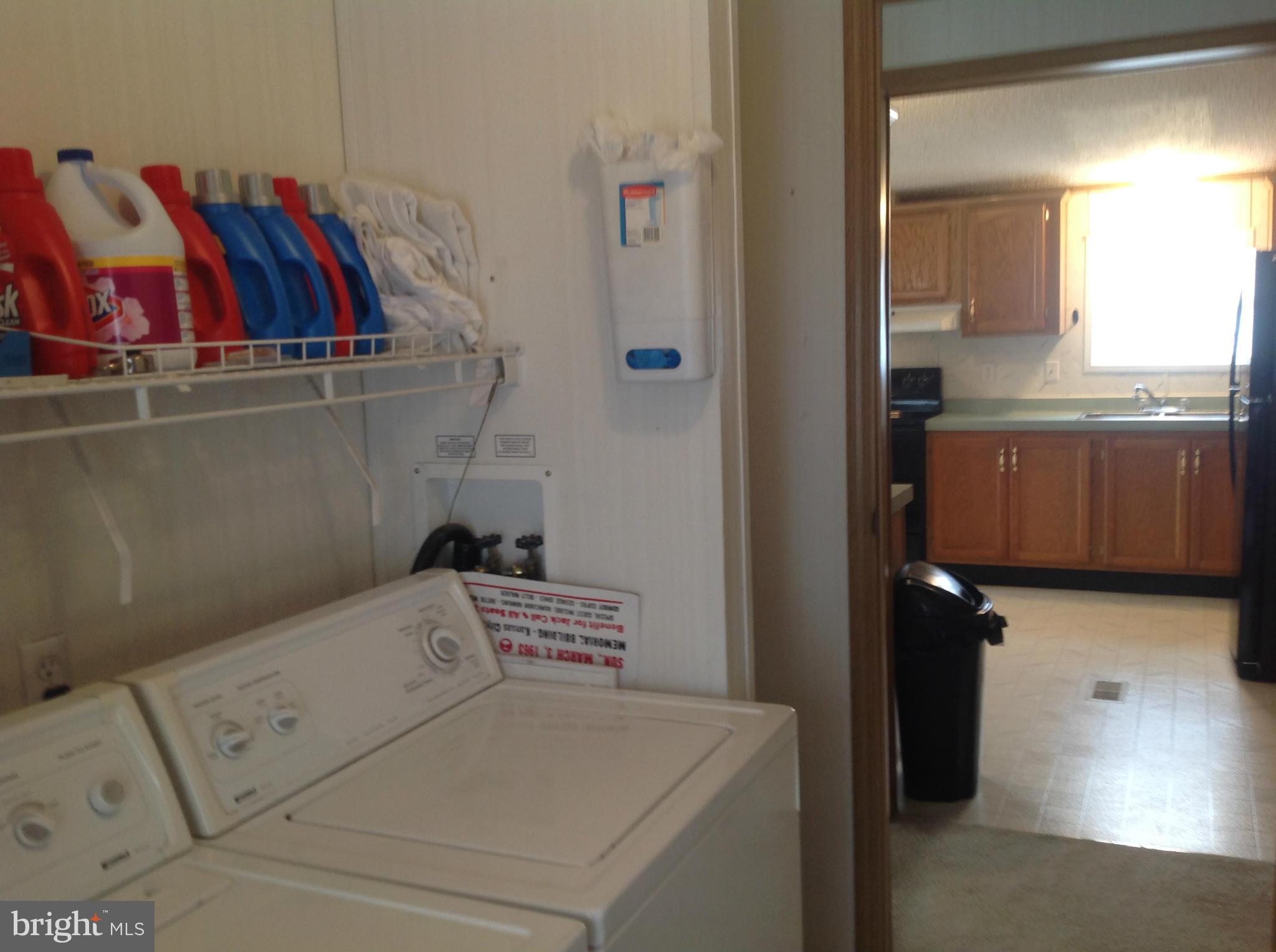 127 Rodeo Circle Middle River, MD 21220 - Photo 22 of 28 a utility room with dryer and washer