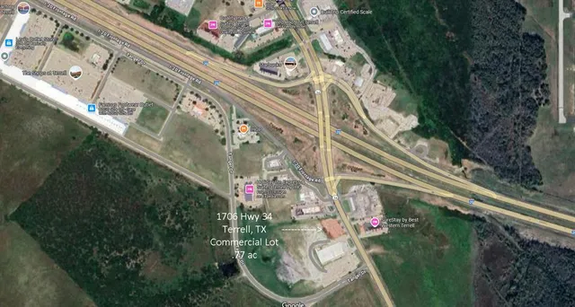 a view of a lake with a house in the background