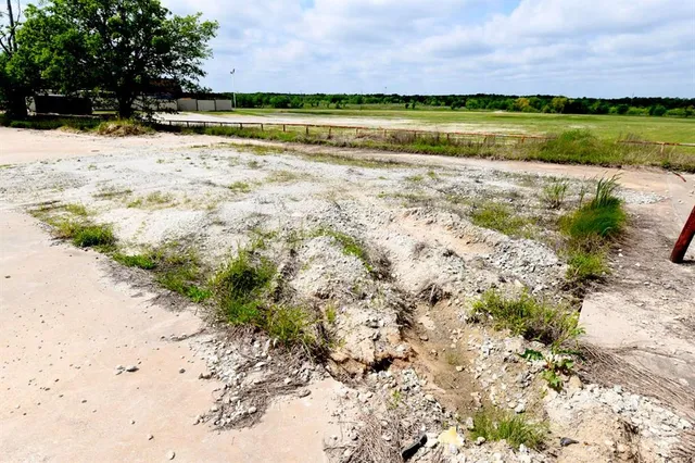 a view of swimming pool with a yard