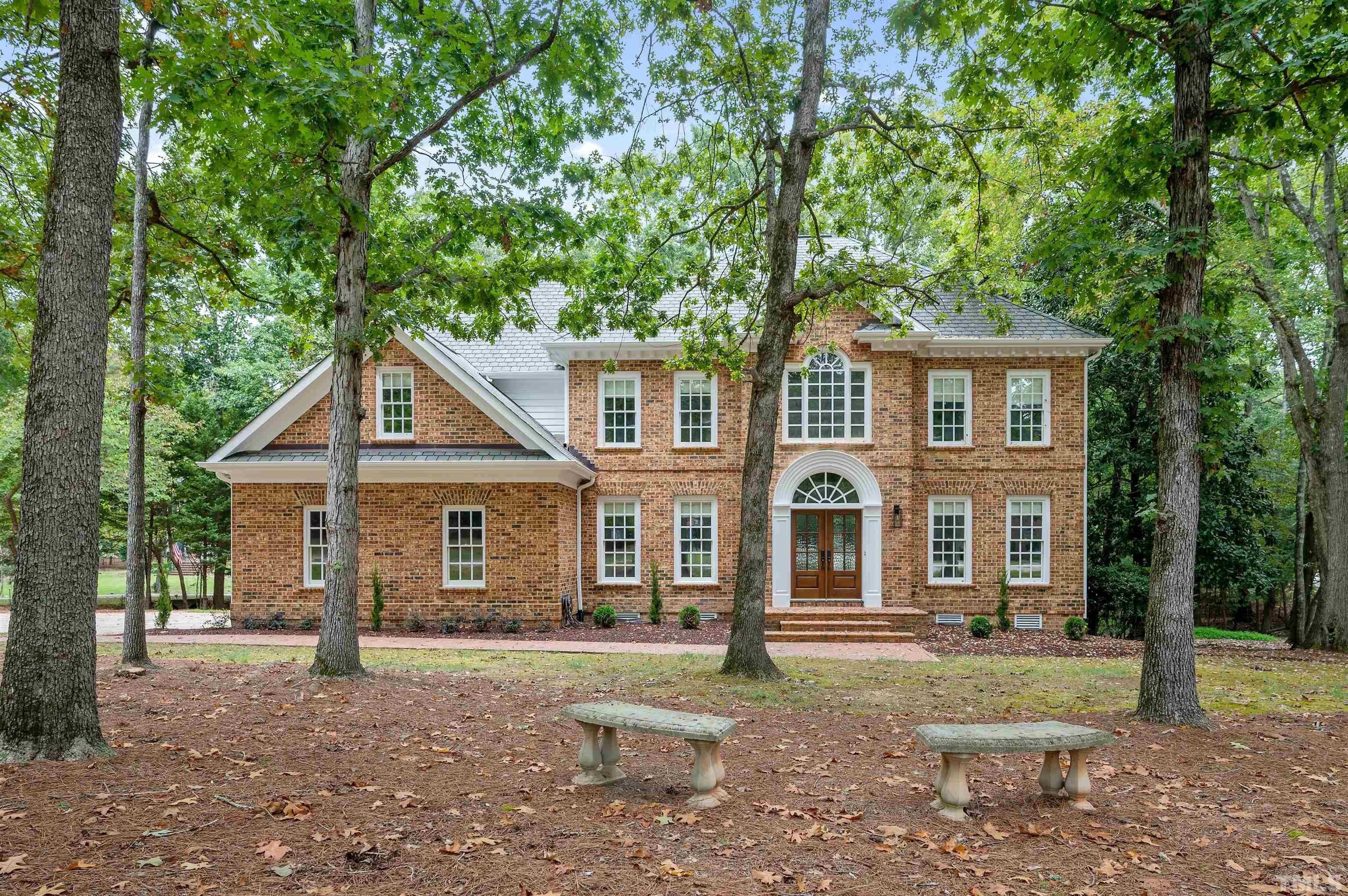1202 Summerville Lane Durham, NC 27712 - Photo 1 of 50 a front view of a house with a yard