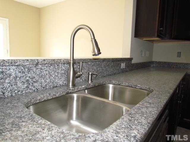4623 Pat Reed Road Raleigh, NC 27616 - Photo 4 of 13 a view closeup a sink and a microwave oven