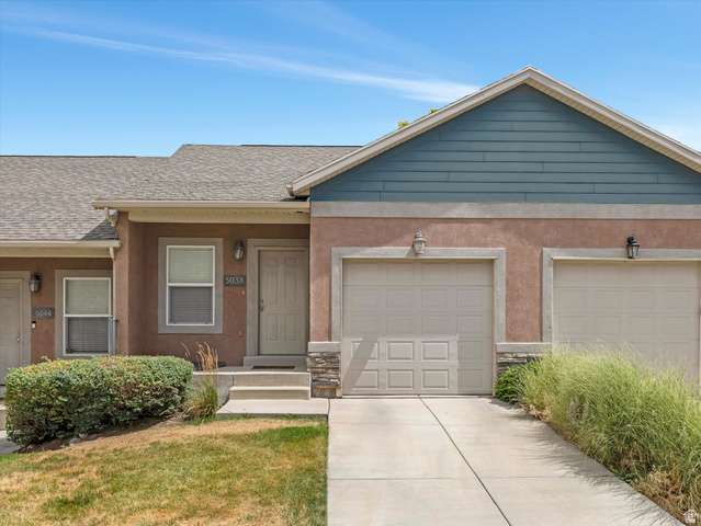 5038 West Red Shale Road Herriman, UT 84096 - Photo 1 of 16 Exterior with a stucco finish and blue siding details
