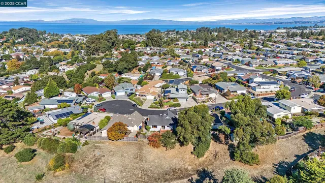 an aerial view of a city with lots of residential buildings