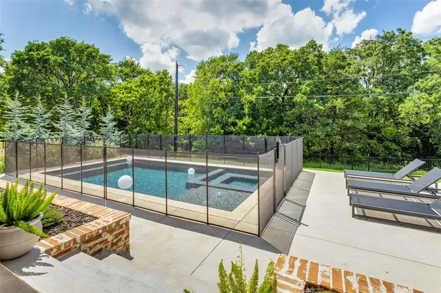a view of a backyard with sitting area and furniture