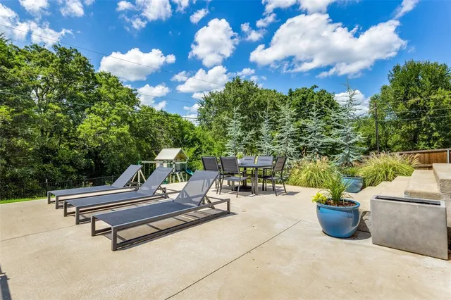 a view of a terrace with sitting area