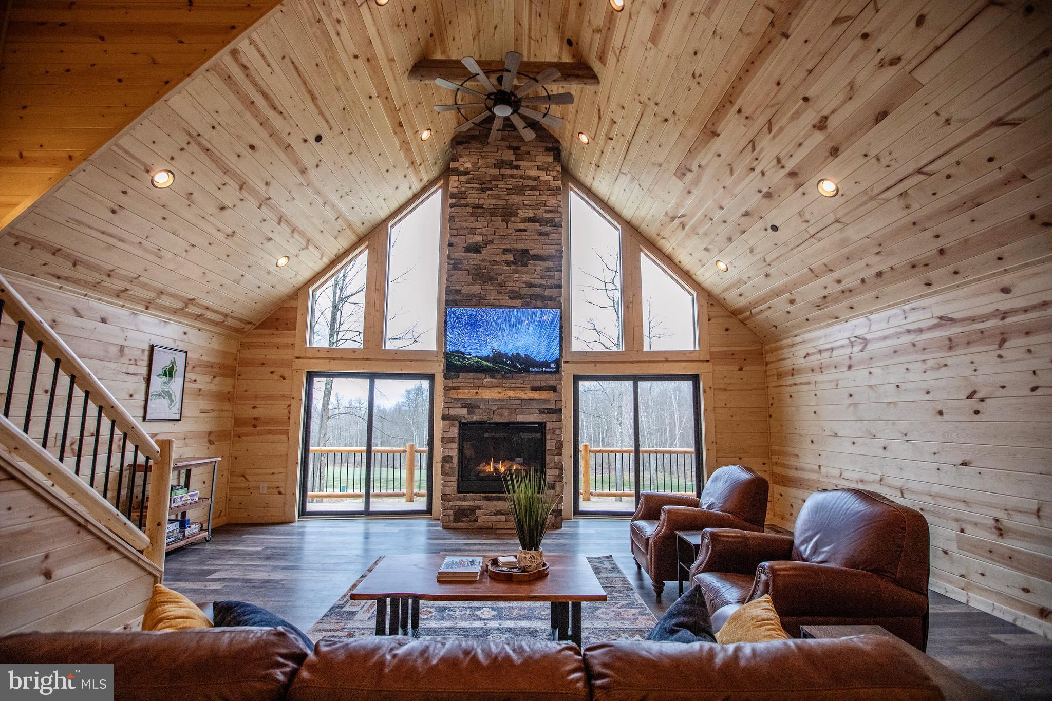 635 Biltmore Rdg Trail McHenry, MD 21541 - Photo 11 of 64 a living room with furniture fireplace and wooden floor
