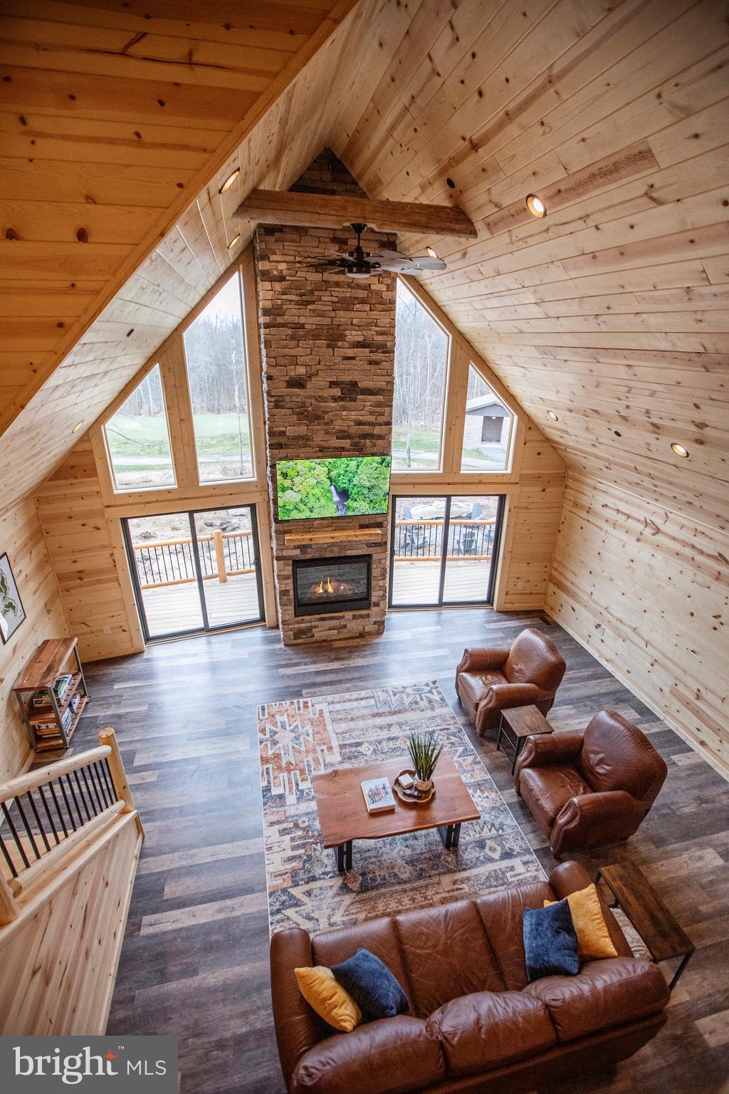 635 Biltmore Rdg Trail McHenry, MD 21541 - Photo 20 of 64 a living room with furniture and a wooden floor