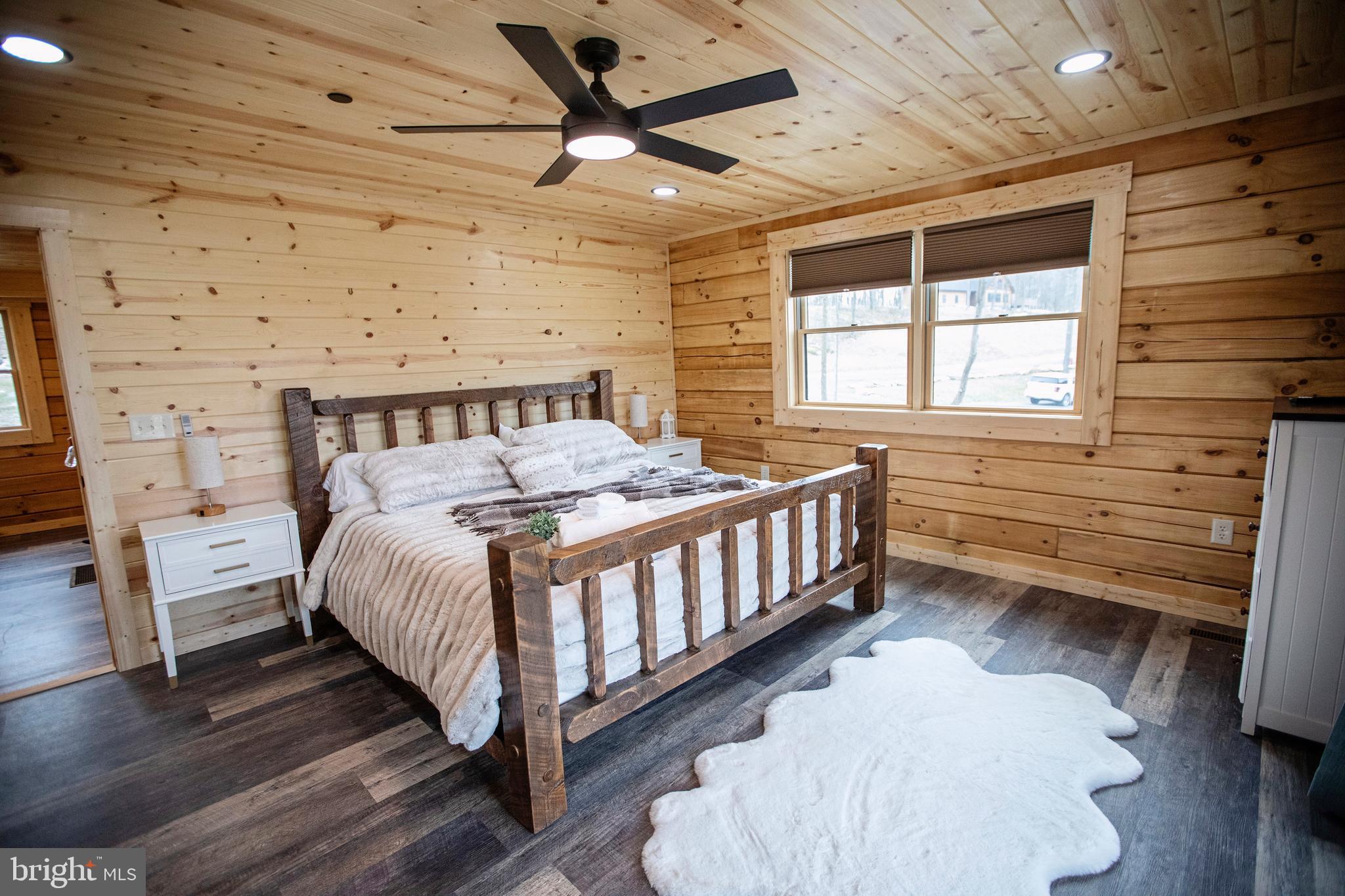635 Biltmore Rdg Trail McHenry, MD 21541 - Photo 26 of 64 a bed room with a bed and a window
