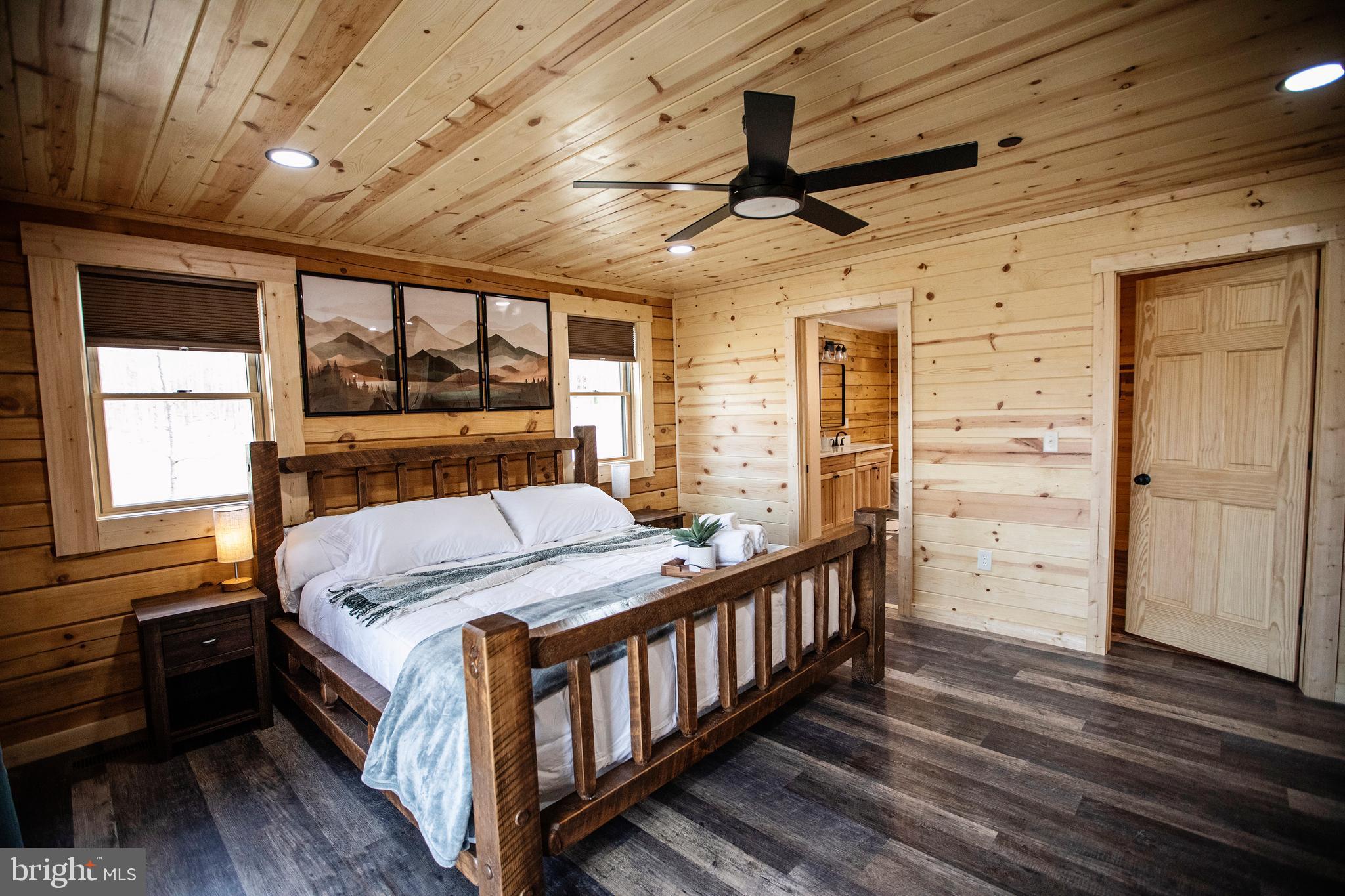 635 Biltmore Rdg Trail McHenry, MD 21541 - Photo 29 of 64 a bed room with a bed and a window