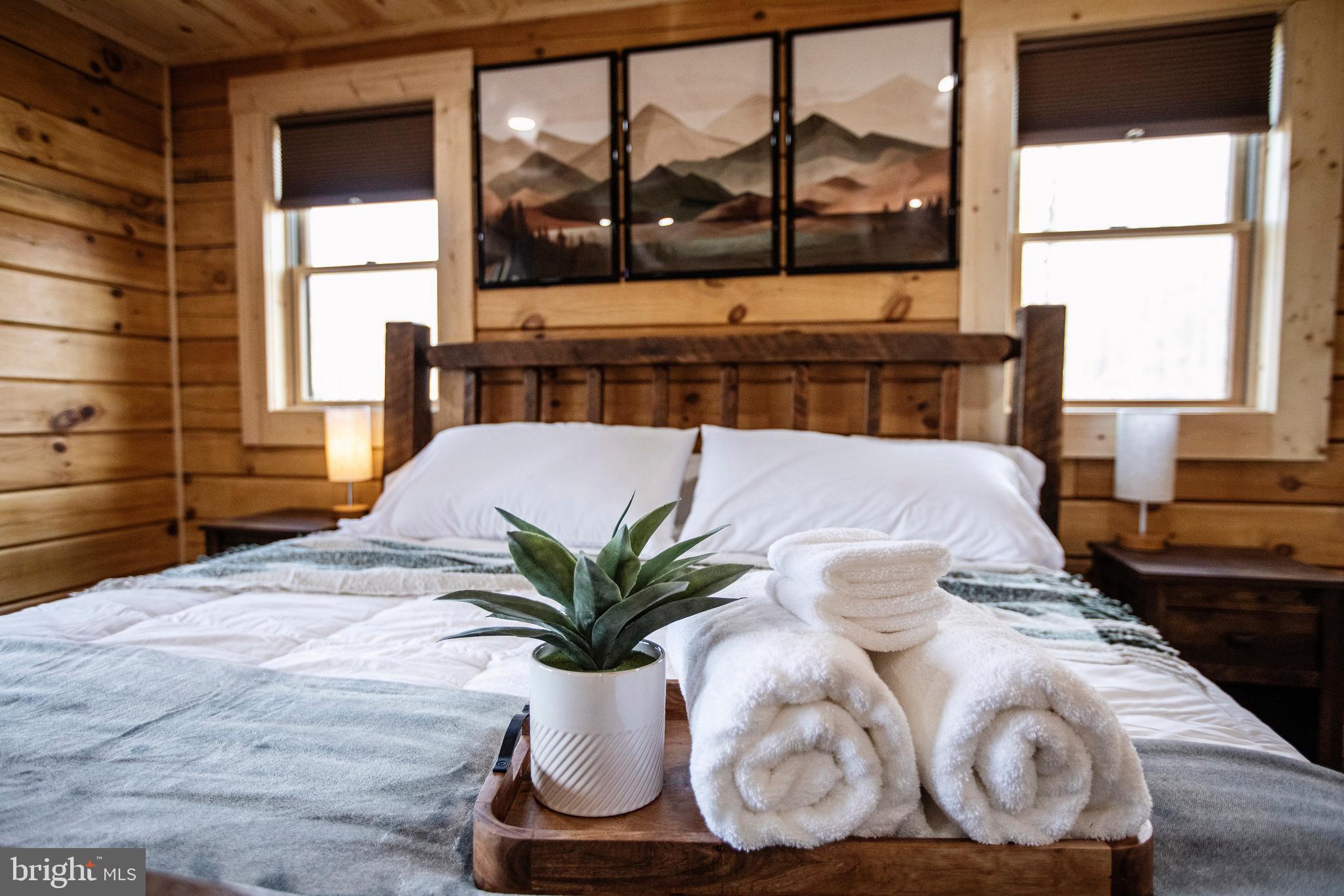 635 Biltmore Rdg Trail McHenry, MD 21541 - Photo 30 of 64 a large white tub sitting in front of a window