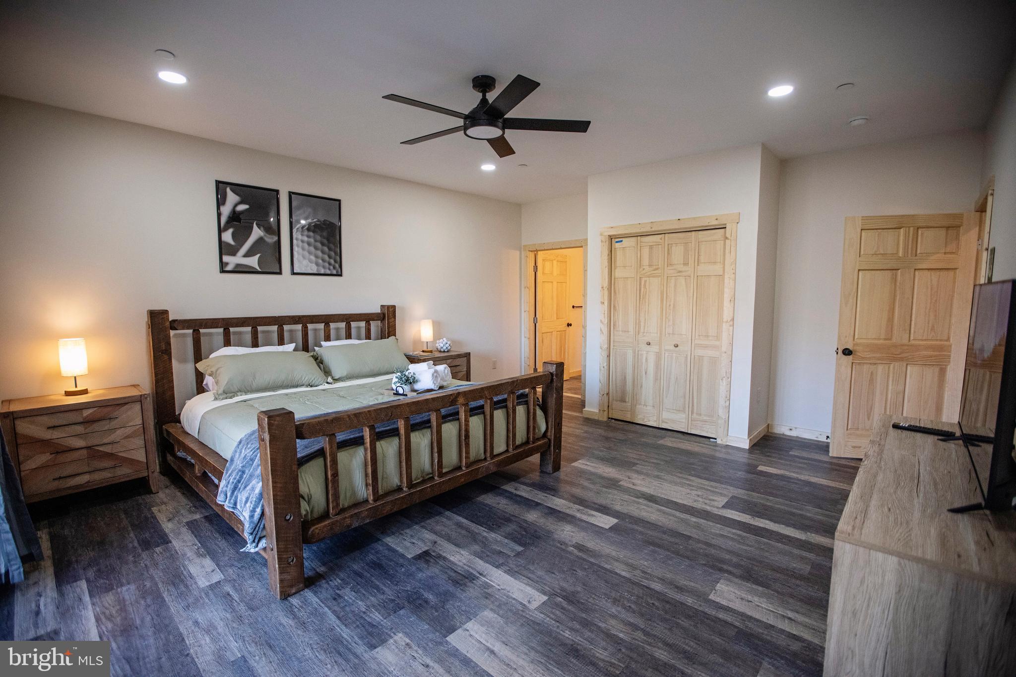 635 Biltmore Rdg Trail McHenry, MD 21541 - Photo 46 of 64 a bedroom with a bed and a ceiling fan