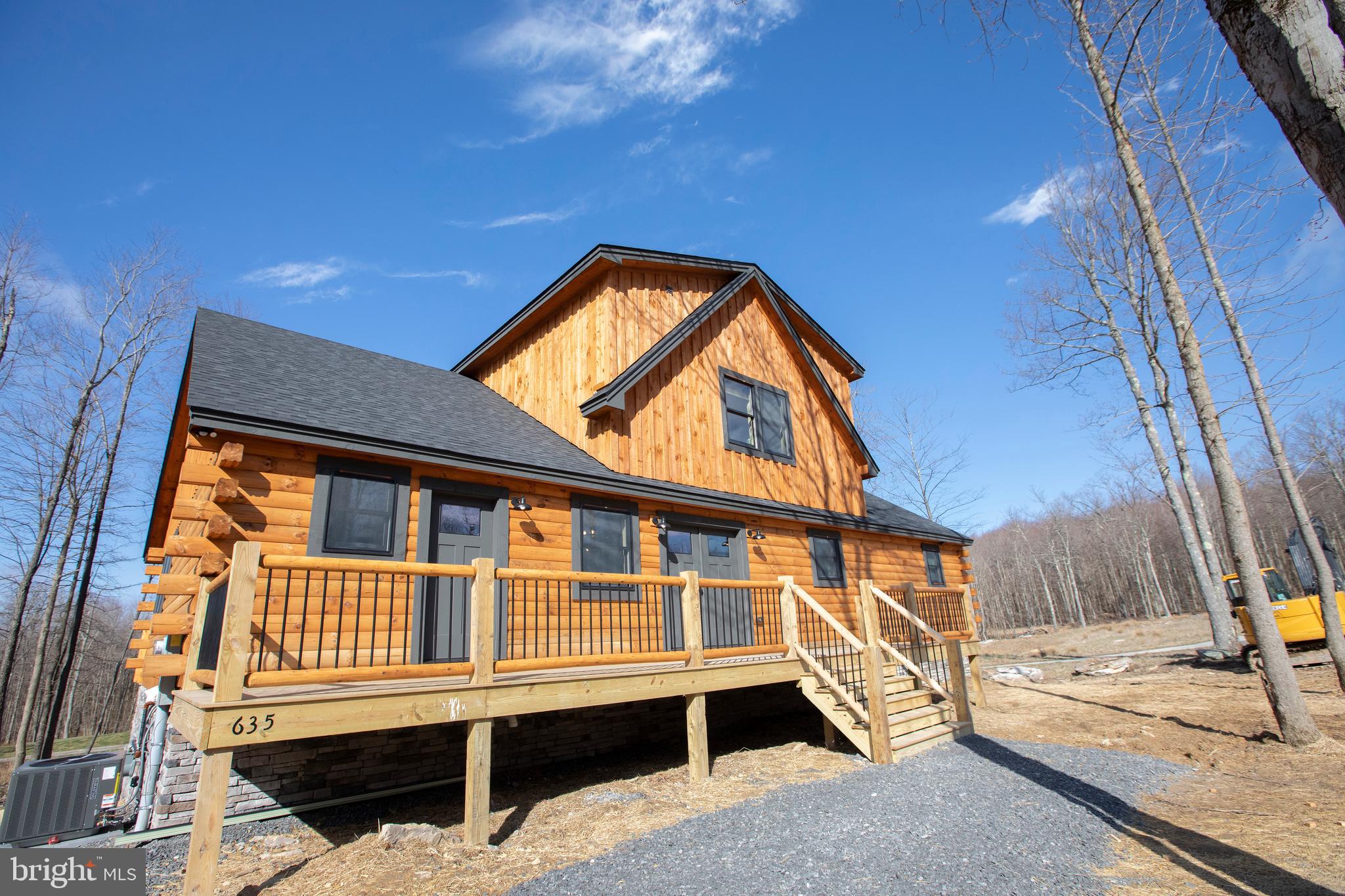 635 Biltmore Rdg Trail McHenry, MD 21541 - Photo 54 of 64 a view of a house with backyard and deck