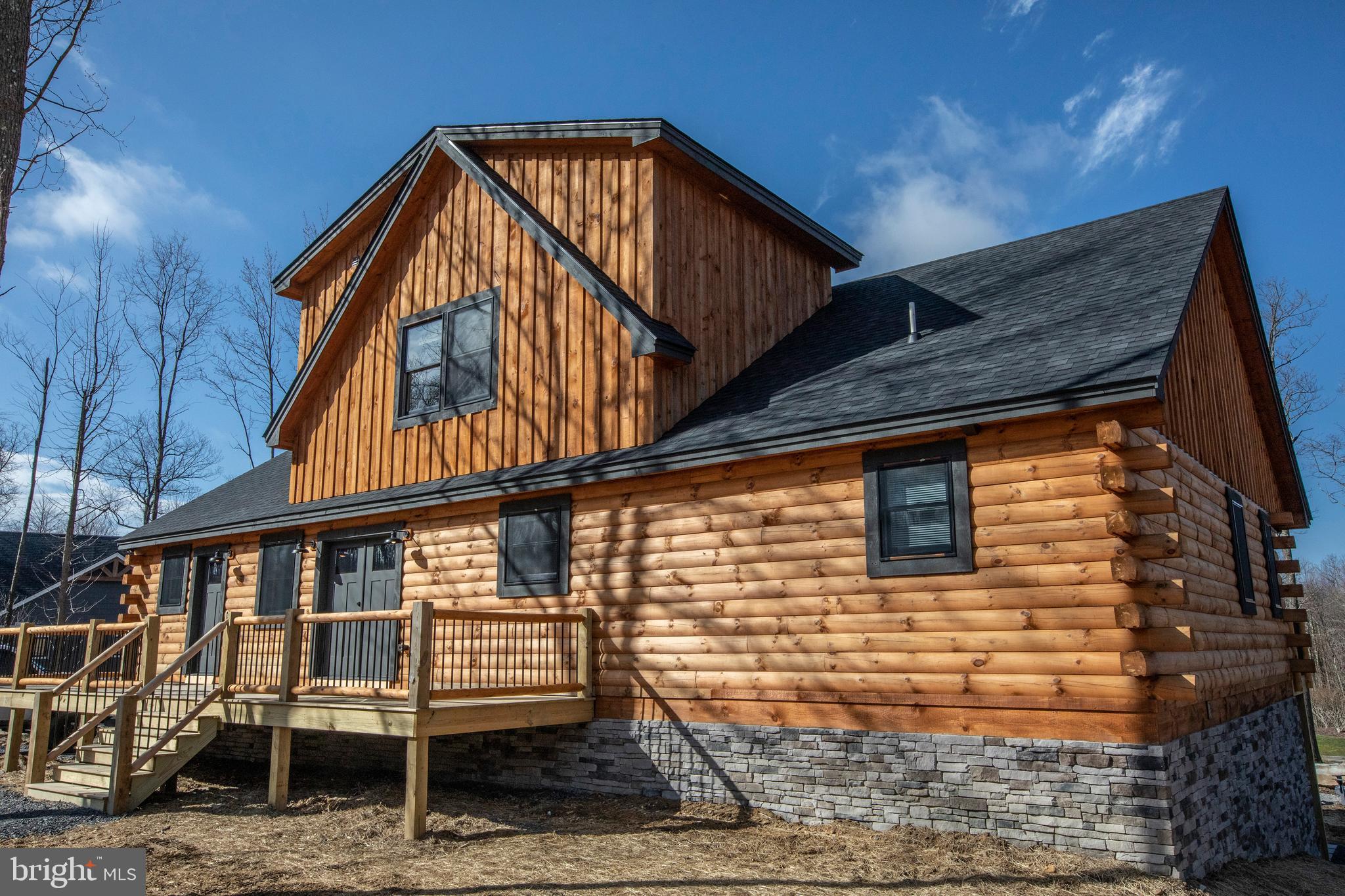 635 Biltmore Rdg Trail McHenry, MD 21541 - Photo 55 of 64 a backyard of a house with wooden deck