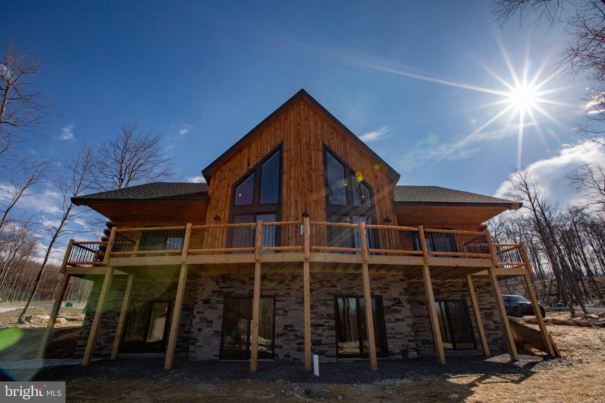 635 Biltmore Rdg Trail McHenry, MD 21541 - Photo 59 of 64 a view of a house with a yard and furniture