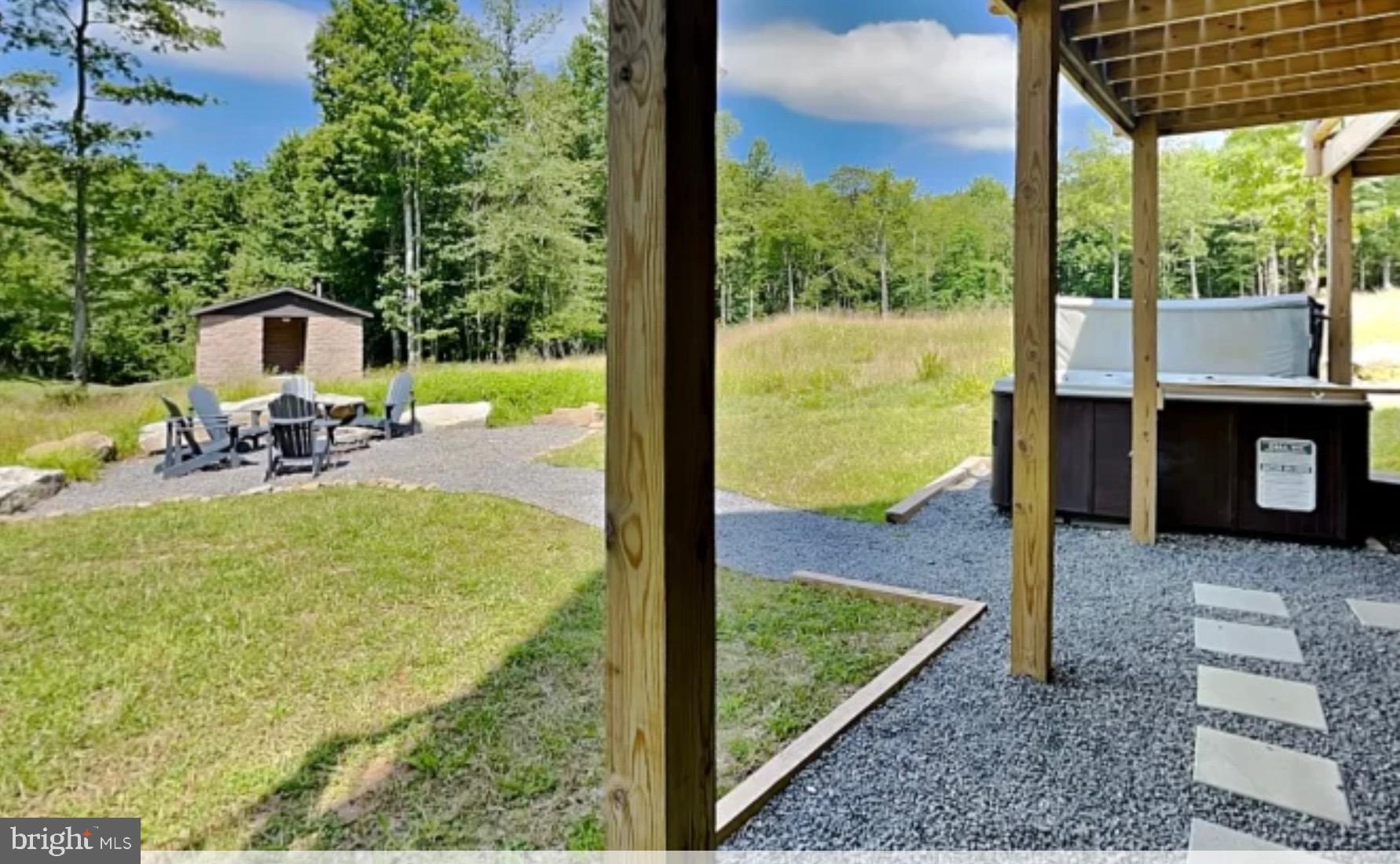 635 Biltmore Rdg Trail McHenry, MD 21541 - Photo 60 of 64 a view of a swimming pool with a patio