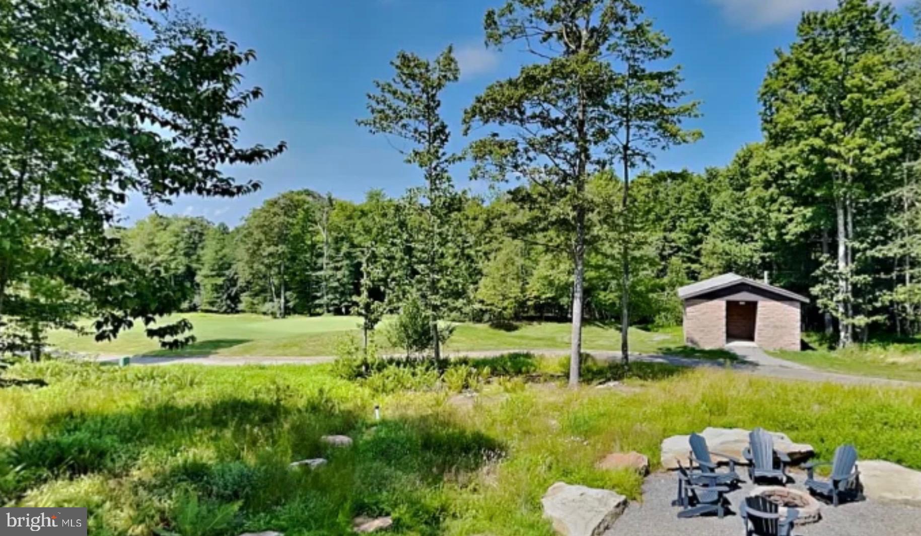 635 Biltmore Rdg Trail McHenry, MD 21541 - Photo 61 of 64 a view of a house with backyard and sitting area