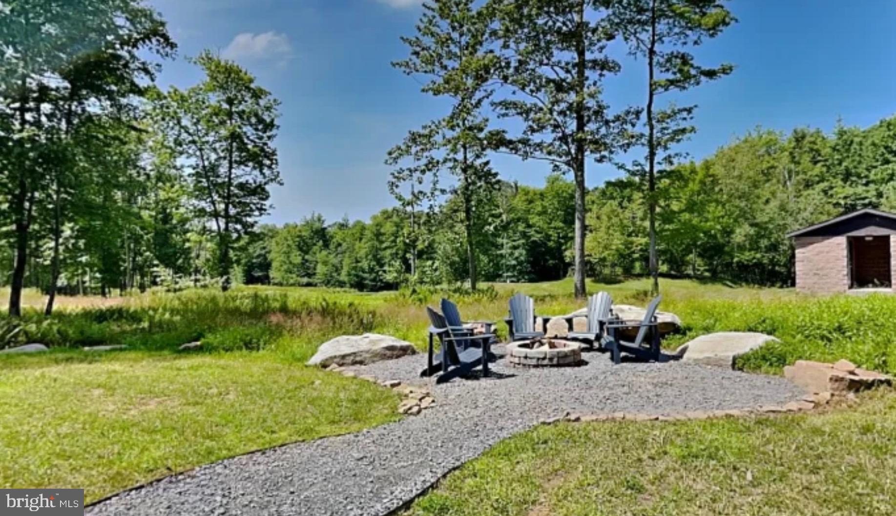 635 Biltmore Rdg Trail McHenry, MD 21541 - Photo 63 of 64 a view of a swimming pool and lounge chairs