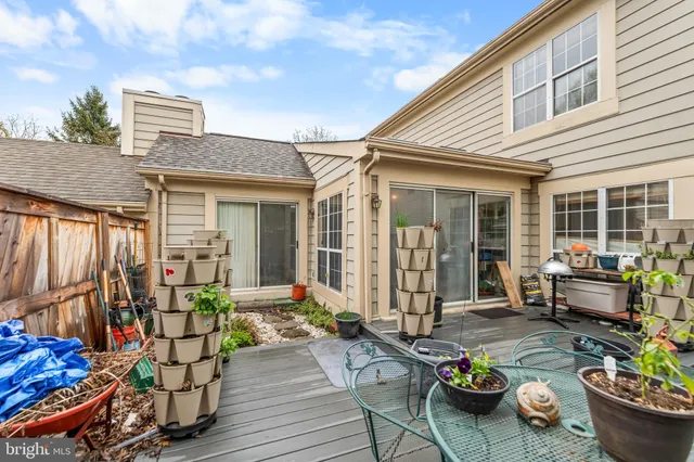 a view of a house with sitting area and furniture