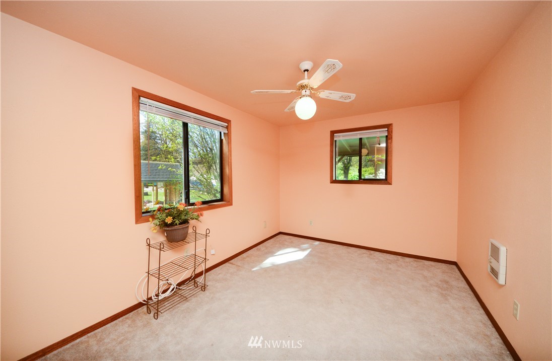 17707 Jordan Street Southwest Rochester, WA 98579 - Photo 12 of 23 a view of an empty room with a window