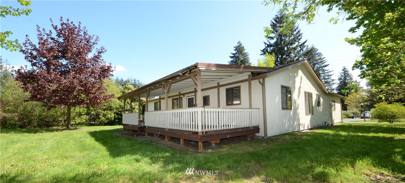 17707 Jordan Street Southwest Rochester, WA 98579 - Photo 13 of 23 a view of a house with a yard