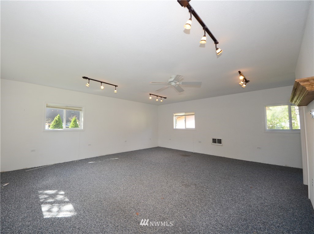 17707 Jordan Street Southwest Rochester, WA 98579 - Photo 15 of 23 an empty room with windows