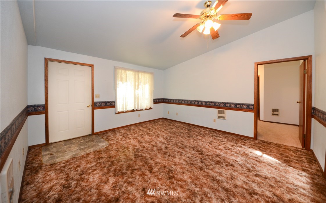 17707 Jordan Street Southwest Rochester, WA 98579 - Photo 8 of 23 a view of an empty room and window
