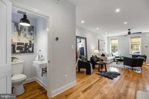 a living room with furniture and a table