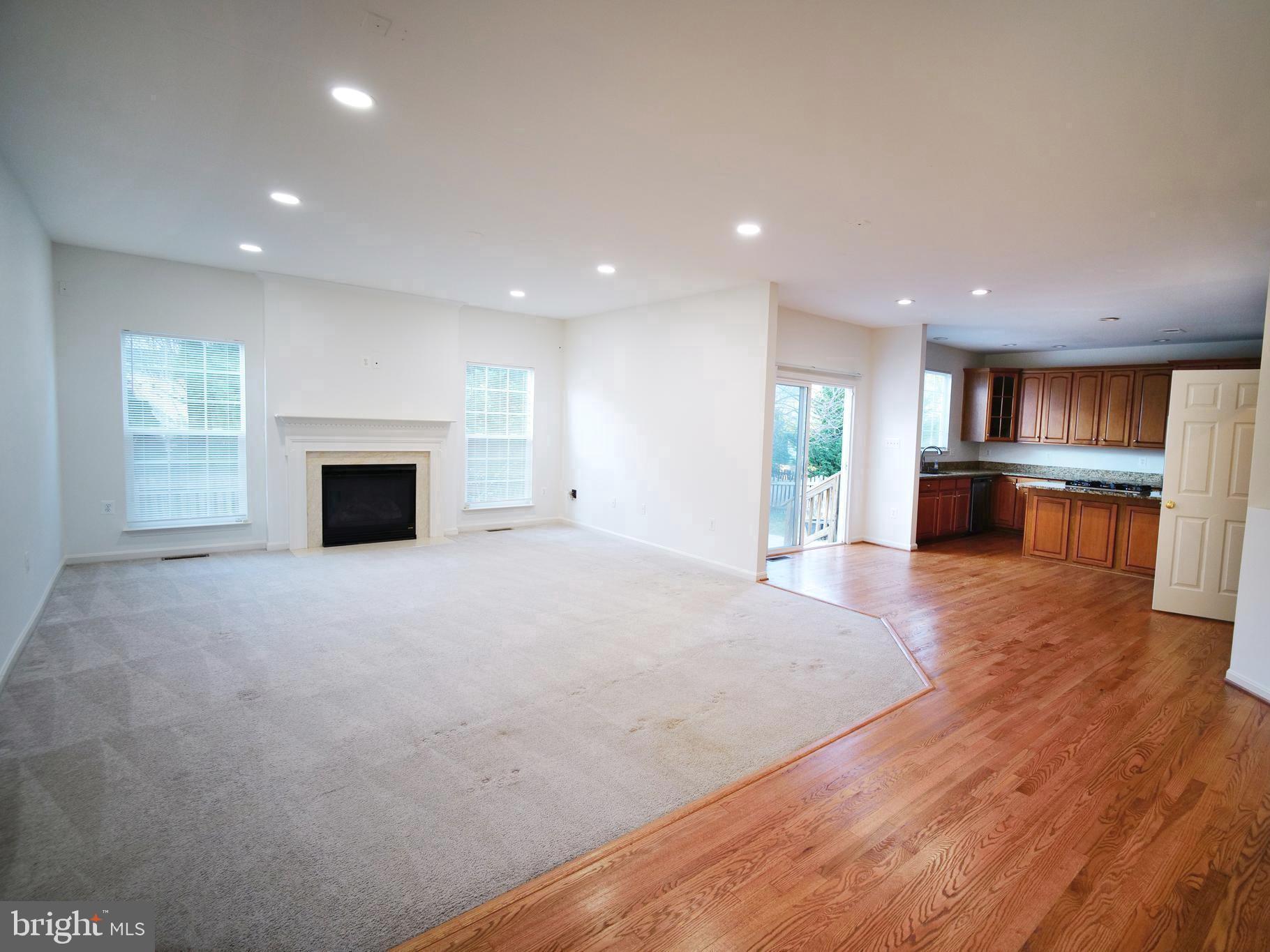 20203 Hopi Drive Ashburn, VA 20147 - Photo 3 of 20 Bright family room w/ fireplace