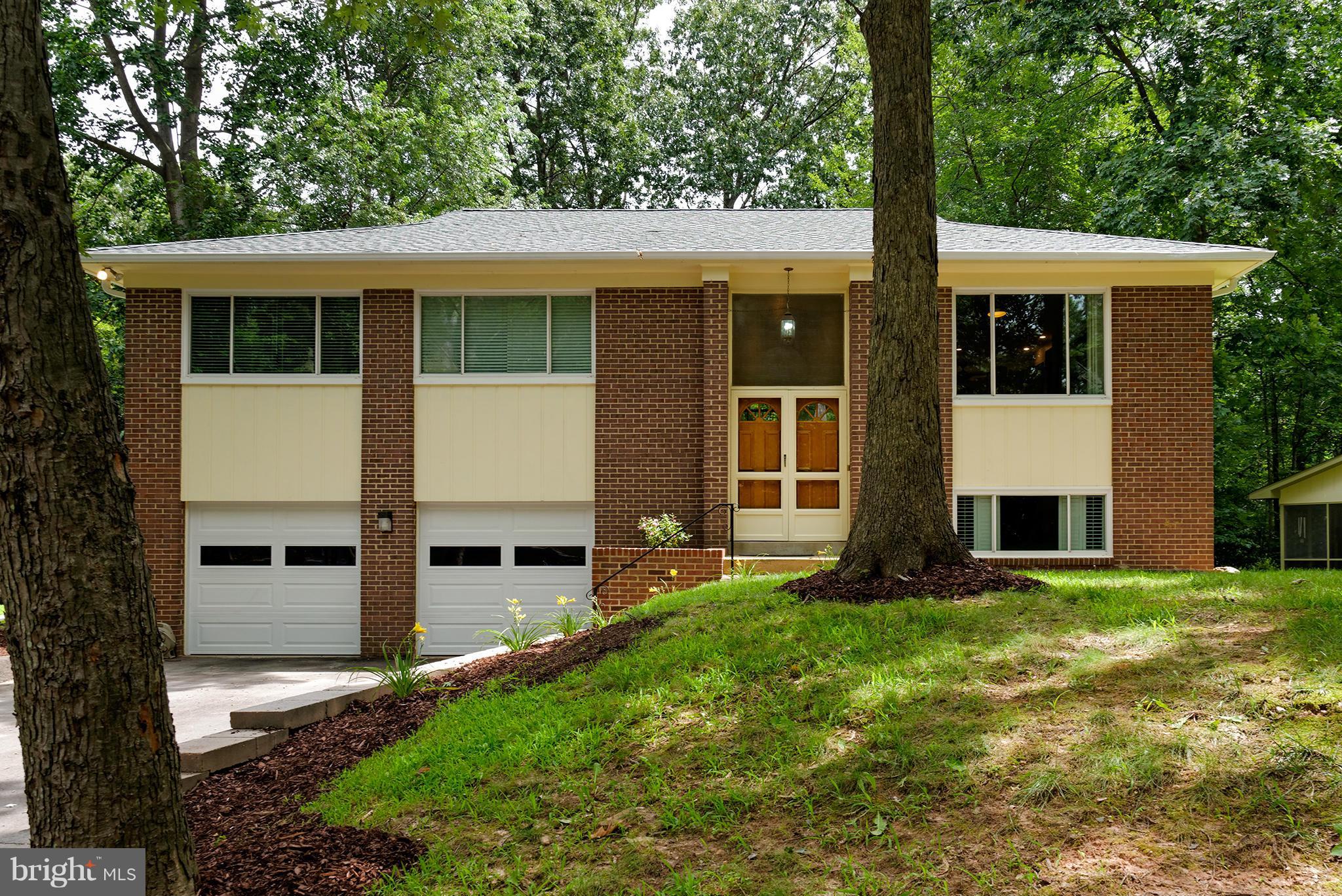 2407 Myrtle Lane Reston, VA 20191 - Photo 3 of 28 a view of a house with a yard