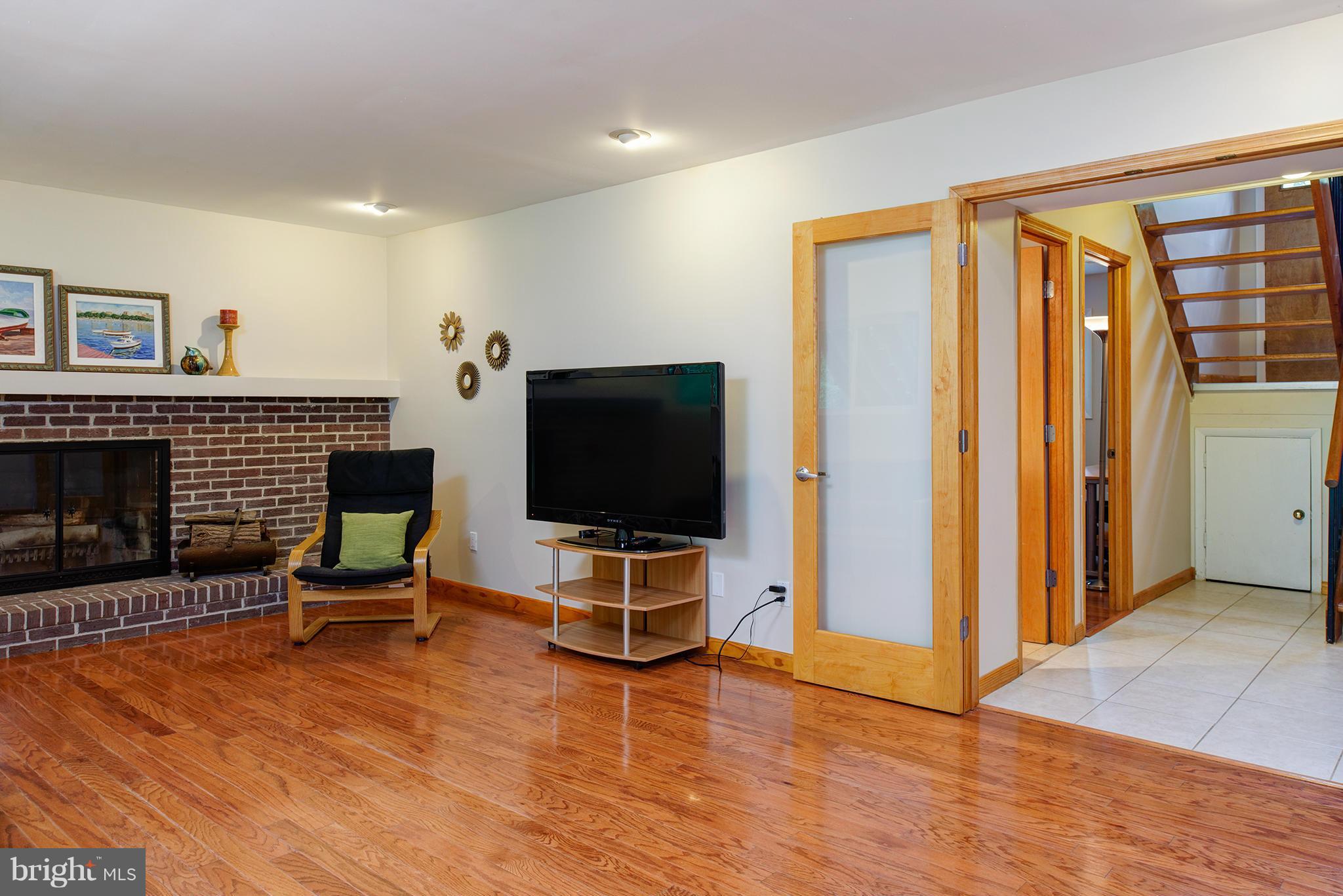 2407 Myrtle Lane Reston, VA 20191 - Photo 21 of 28 a view of a livingroom with furniture and a flat screen tv