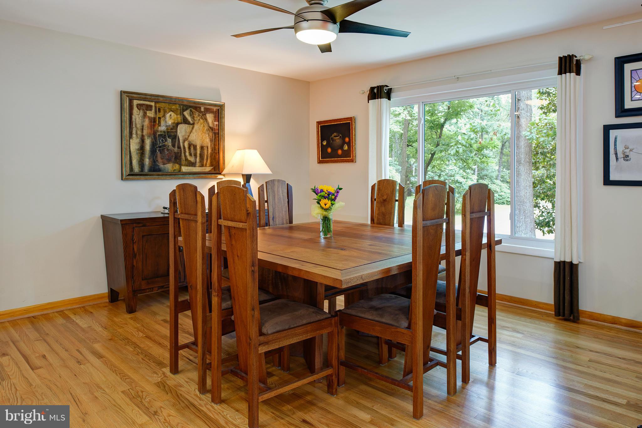 2407 Myrtle Lane Reston, VA 20191 - Photo 7 of 28 a view of a dining room with furniture window and wooden floor