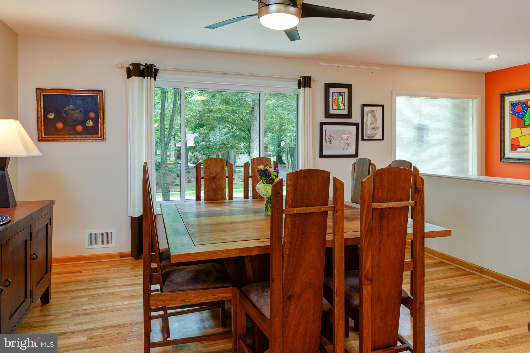 2407 Myrtle Lane Reston, VA 20191 - Photo 8 of 28 a living room with furniture and a wooden floor