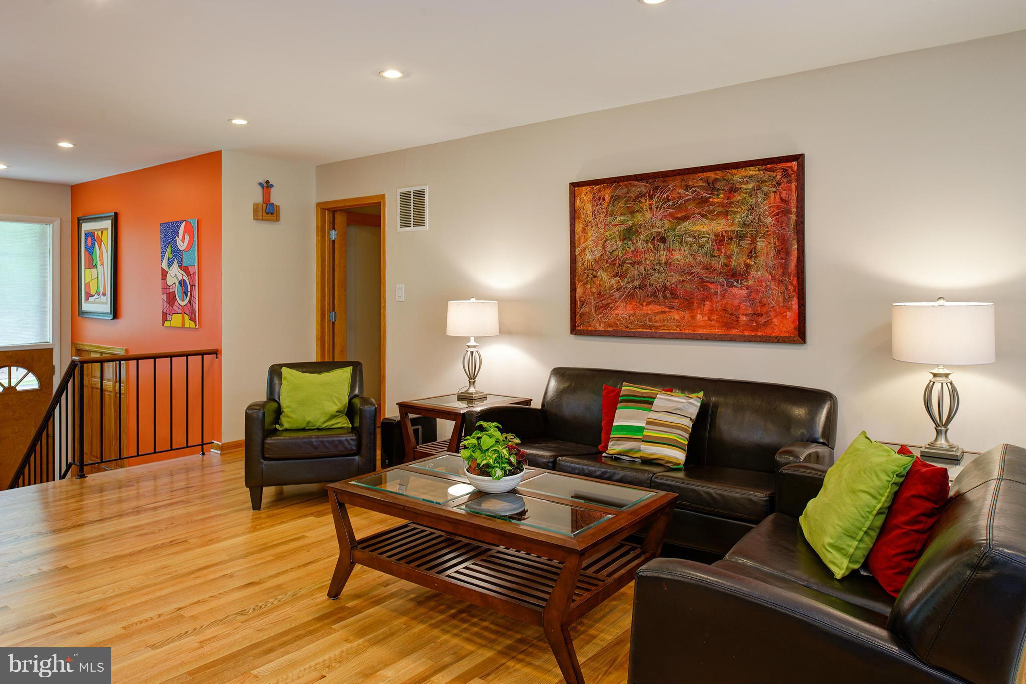 2407 Myrtle Lane Reston, VA 20191 - Photo 10 of 28 a living room with furniture and wooden floor