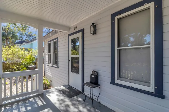 a utility room with multiple dryer and washer