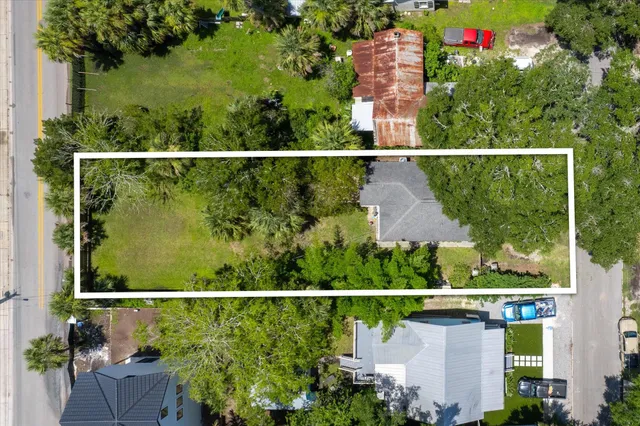 an outdoor space with seating area and garden view