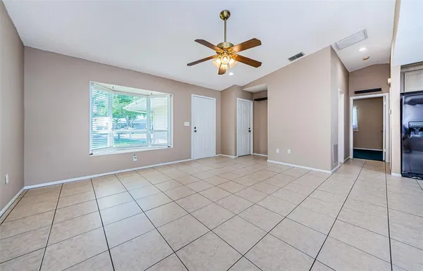 a view of an empty room and window