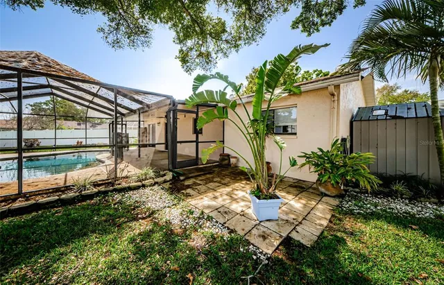 a backyard of a house with lots of green space