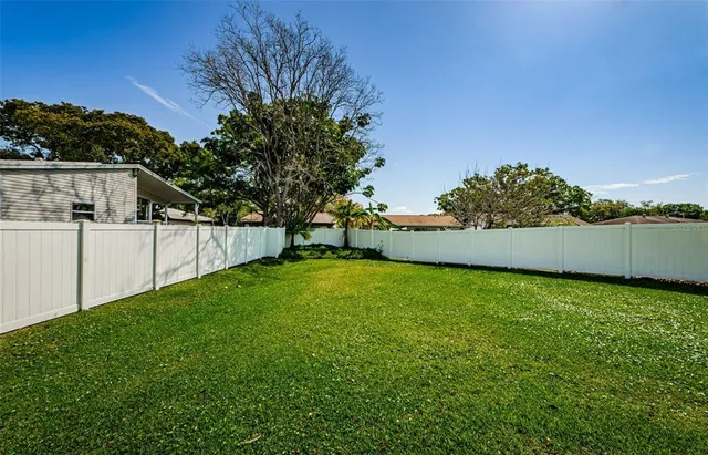 a view of a backyard with a garden