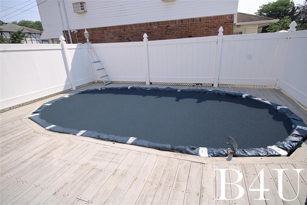 2268 56th Drive Brooklyn, NY 11234 - Photo 18 of 20 an outdoor space with wooden floor