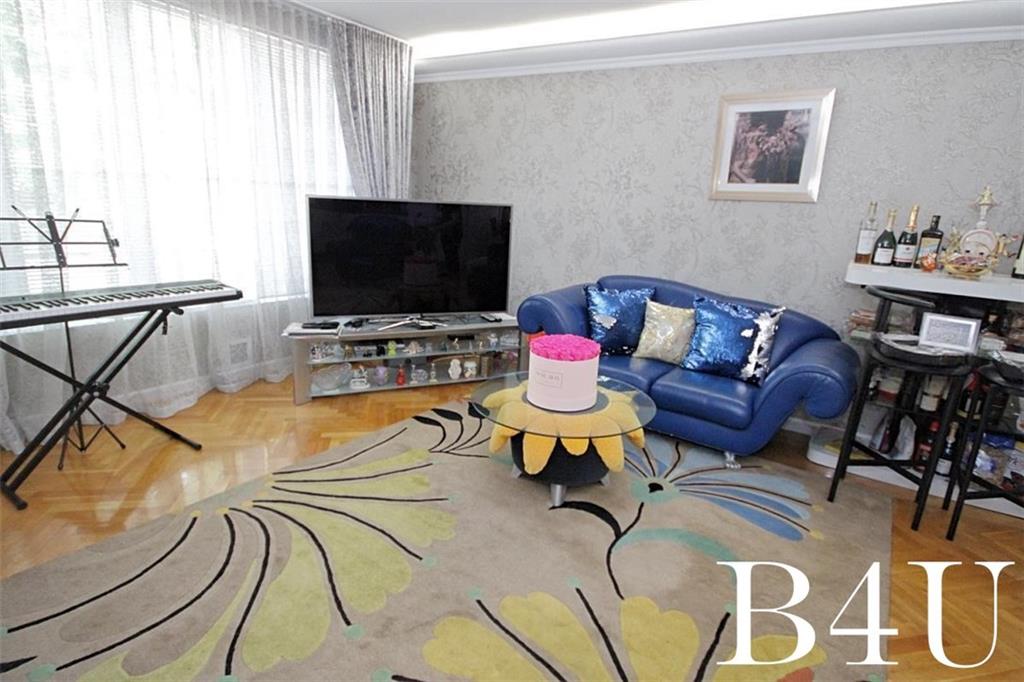 2268 56th Drive Brooklyn, NY 11234 - Photo 4 of 20 a living room with furniture and a flat screen tv