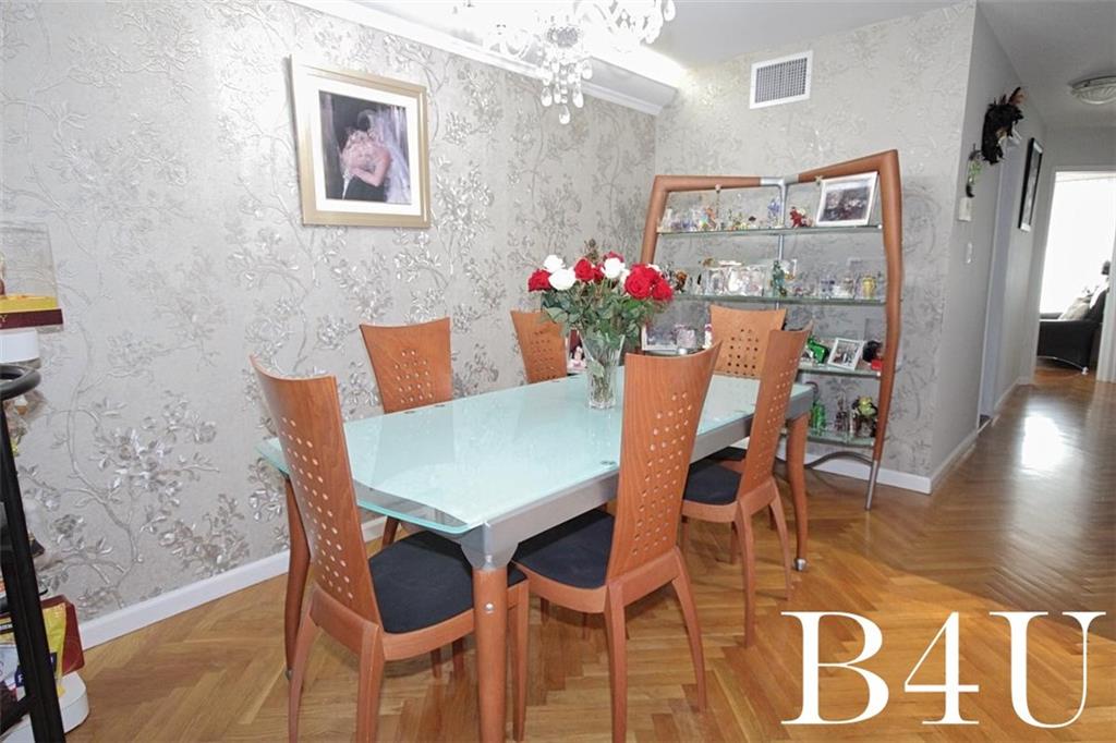 2268 56th Drive Brooklyn, NY 11234 - Photo 6 of 20 a view of a dining room with furniture and wooden floor