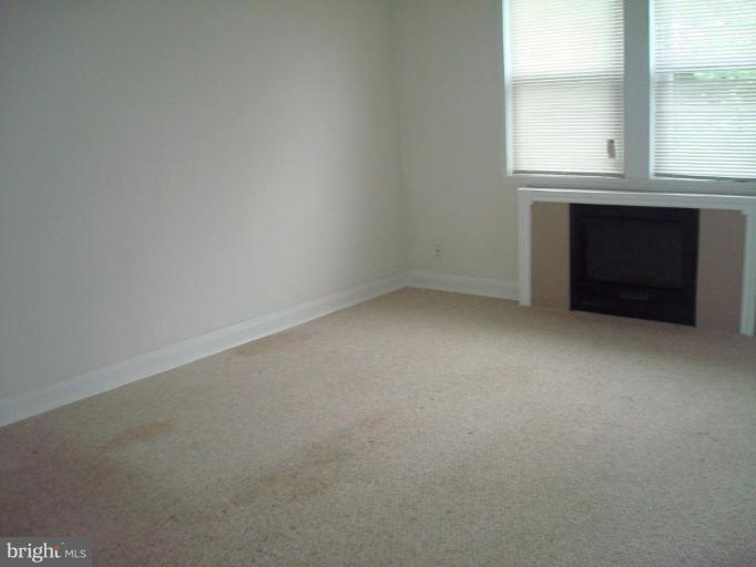 1536 Roundhill Road Baltimore, MD 21218 - Photo 16 of 26 Master Bedrm w/ Fireplace