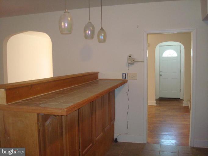 1536 Roundhill Road Baltimore, MD 21218 - Photo 23 of 26 kitchen Island