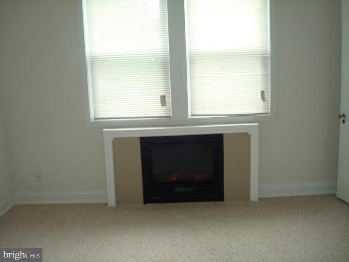 1536 Roundhill Road Baltimore, MD 21218 - Photo 25 of 26 Master Bedrm Fireplace