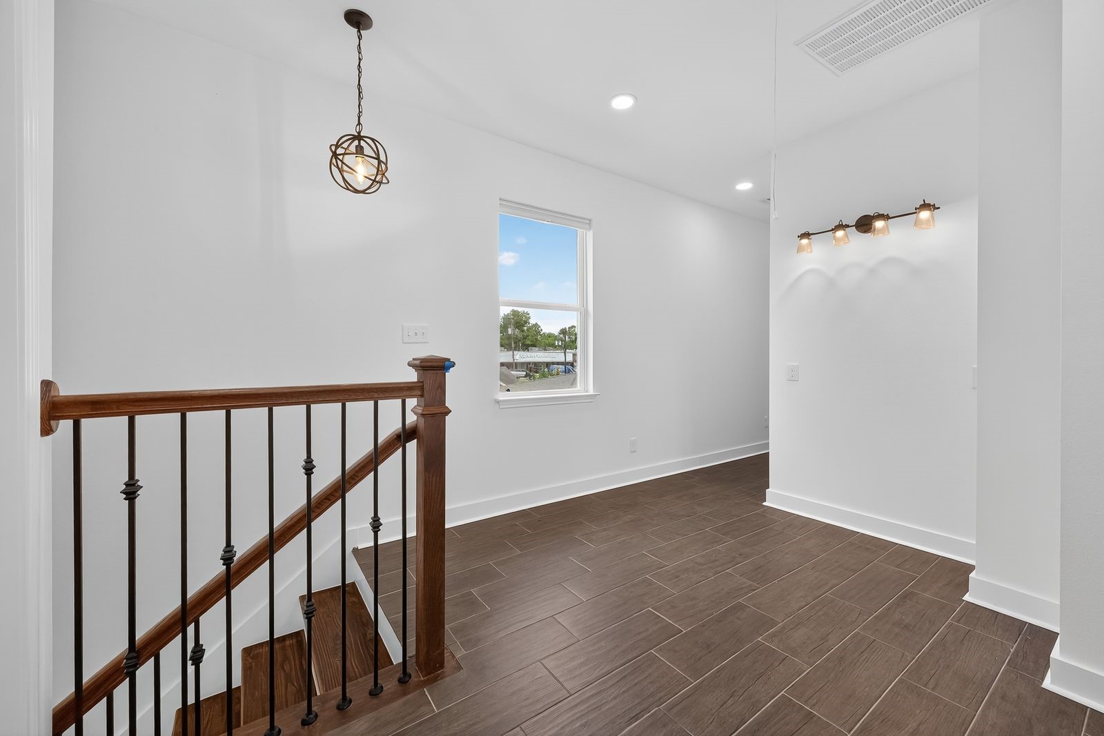 714 Zoe Street Houston, TX 77020 - Photo 15 of 34 a view of an entryway with wooden floor