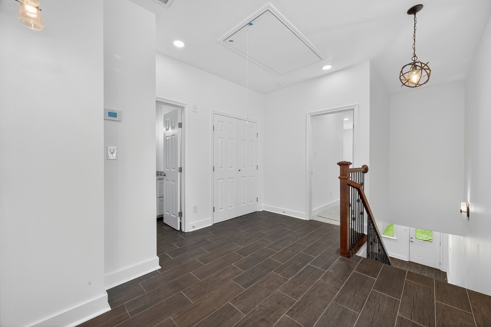 714 Zoe Street Houston, TX 77020 - Photo 16 of 34 a view of empty room with wooden floor