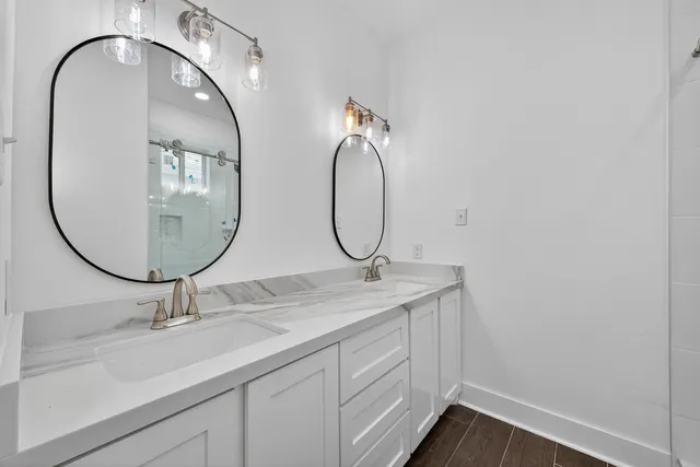 a view of a brick house with a large window