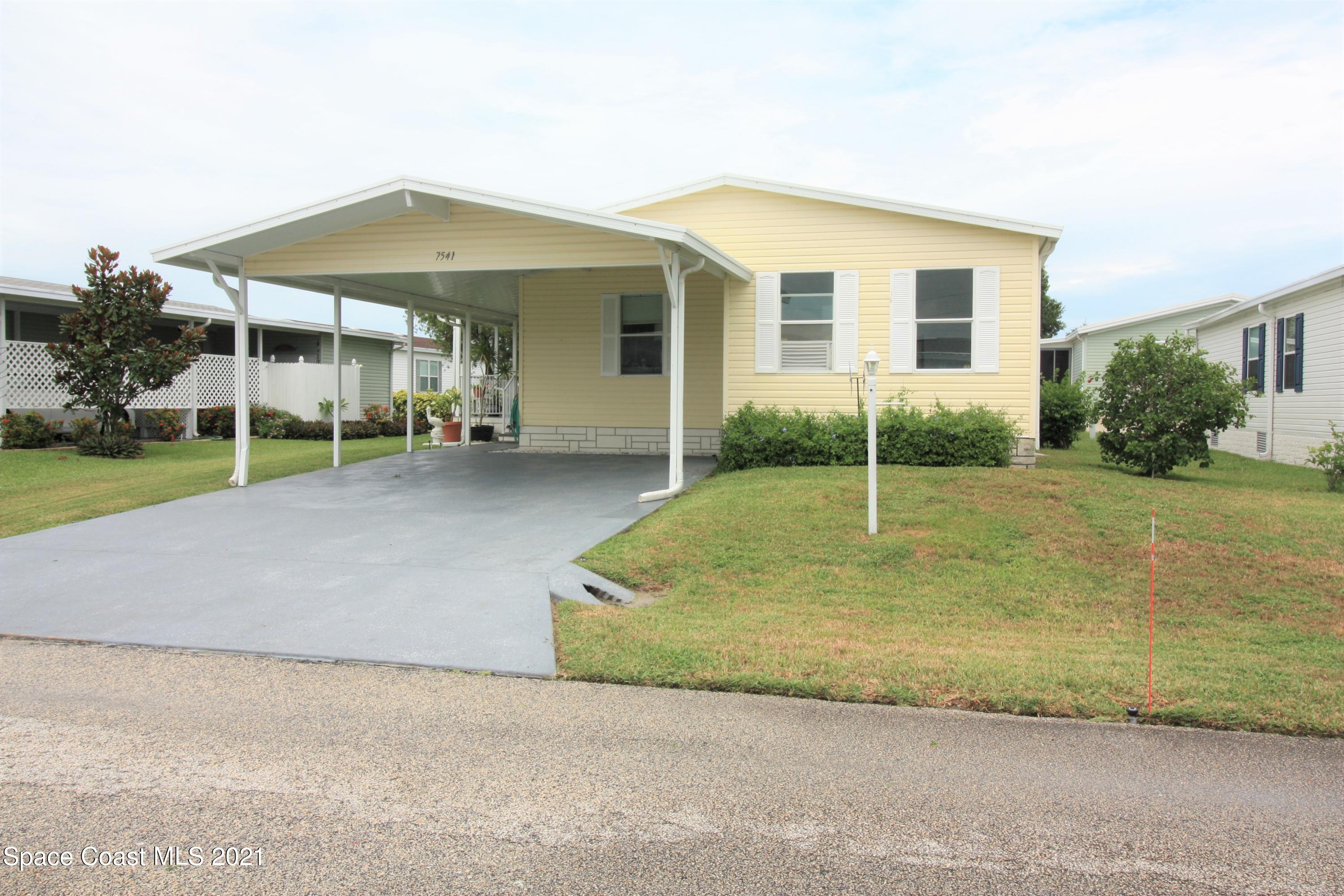 7541 Cedar Bark Road Micco, FL 32976 - Photo 2 of 20 Front